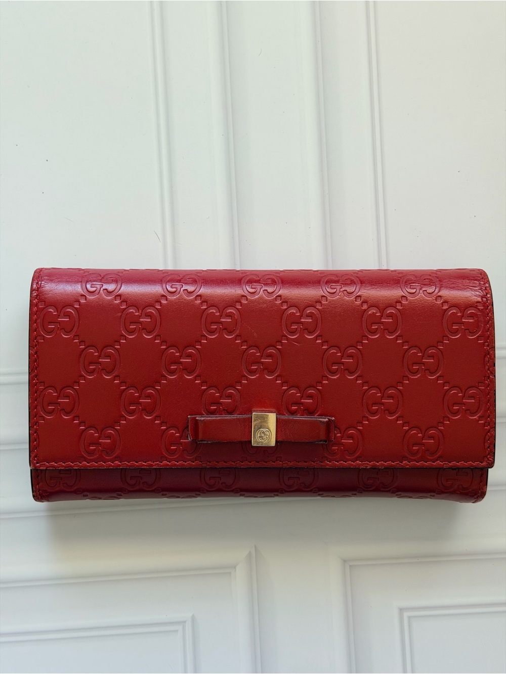 Gucci Red GG Embossed Leather Bow-Accent Continental Wallet